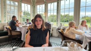 My daughter enjoying the elegant dining room at Gleneagles